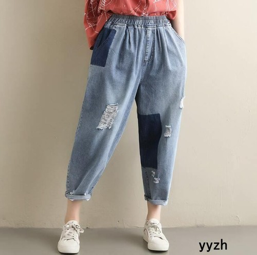 jeans with holes in the front and back